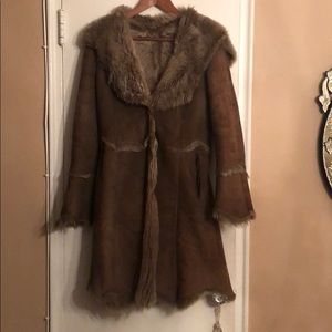 Suede outside with shearling inside coat
